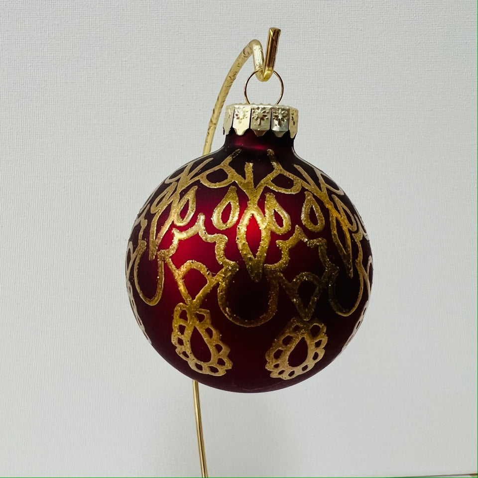 Burgundy Glass Ornament with Embossed Gold Design