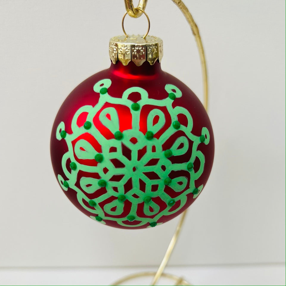 Red Glass Ornament with Hand-Painted Green Mandala