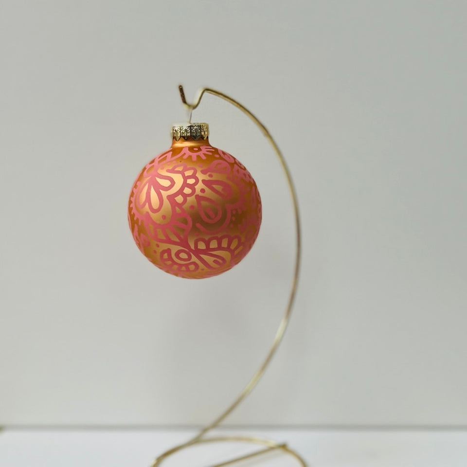 Gold Glass Ornament with Hand-Painted Coral Design