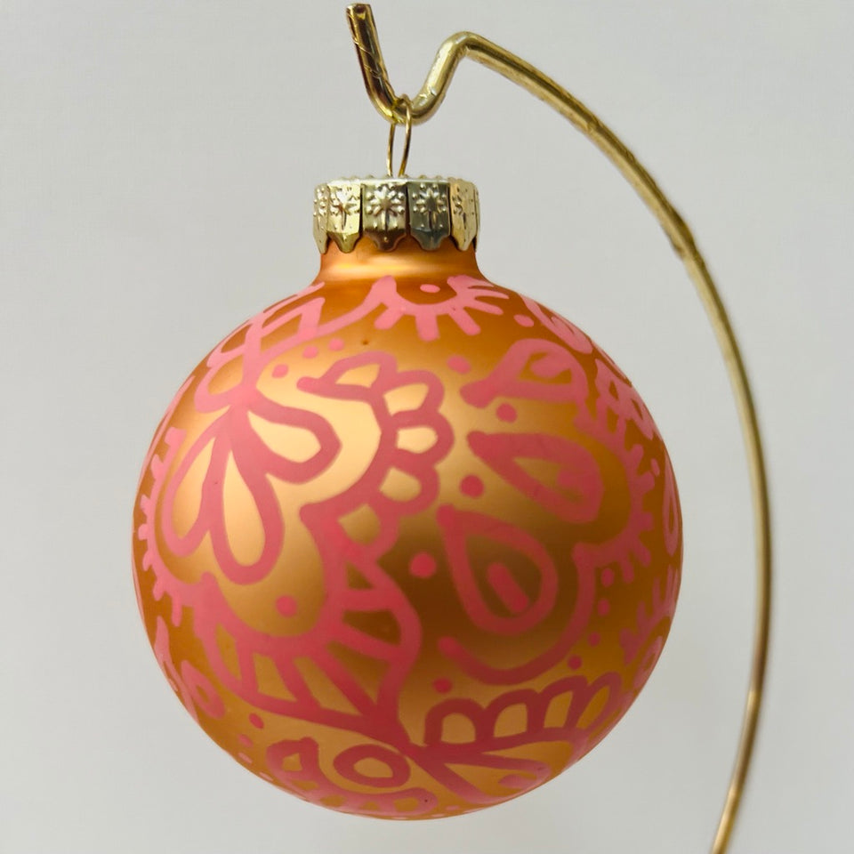 Gold Glass Ornament with Hand-Painted Coral Design