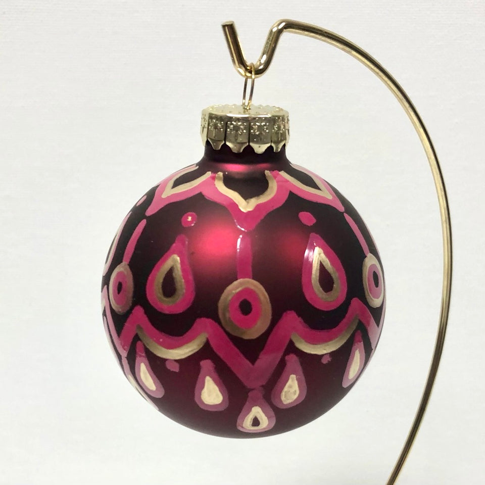 Burgundy Glass Ornament with Hand-painted Gold and Pink Design