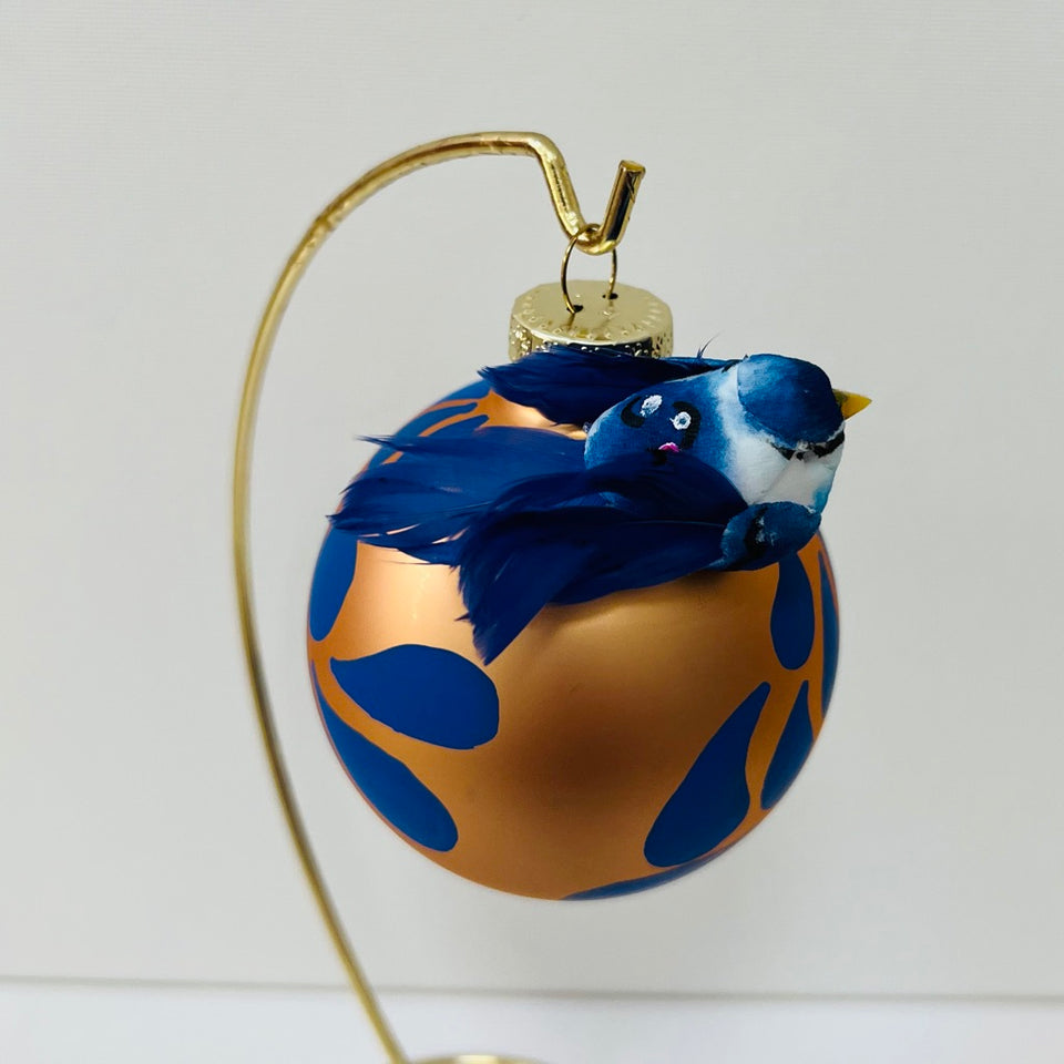 Dark Gold Glass Ornament with Blue Bird and Hand-Painted blue patterning