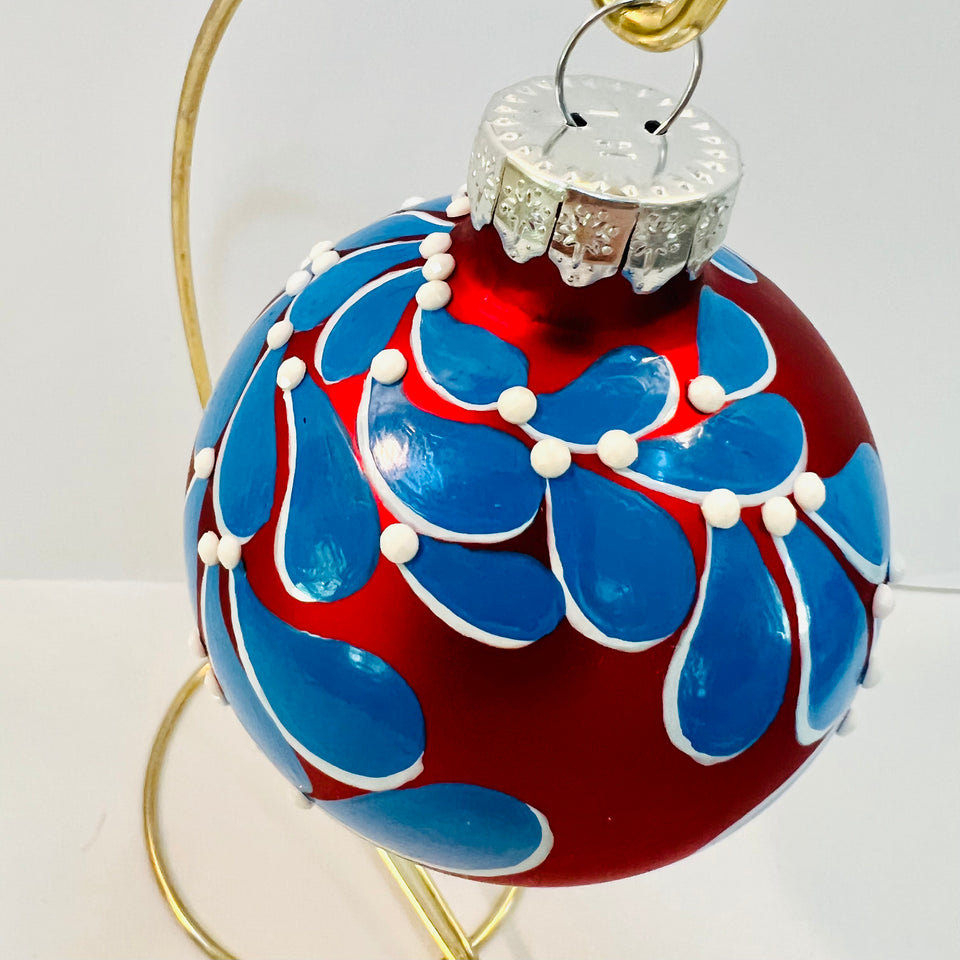 Red Glass Ornament with Hand-painted Blue Design