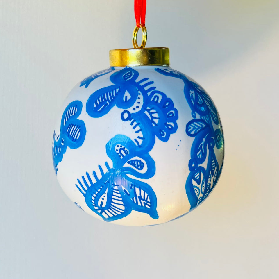 White Glass Ornament with Hand-painted Blue Design