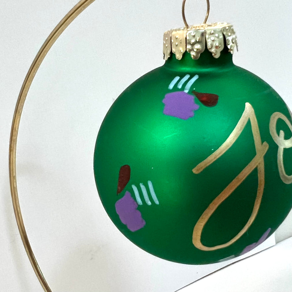 Green Glass Ornament with Hand-painted Lettering and Design