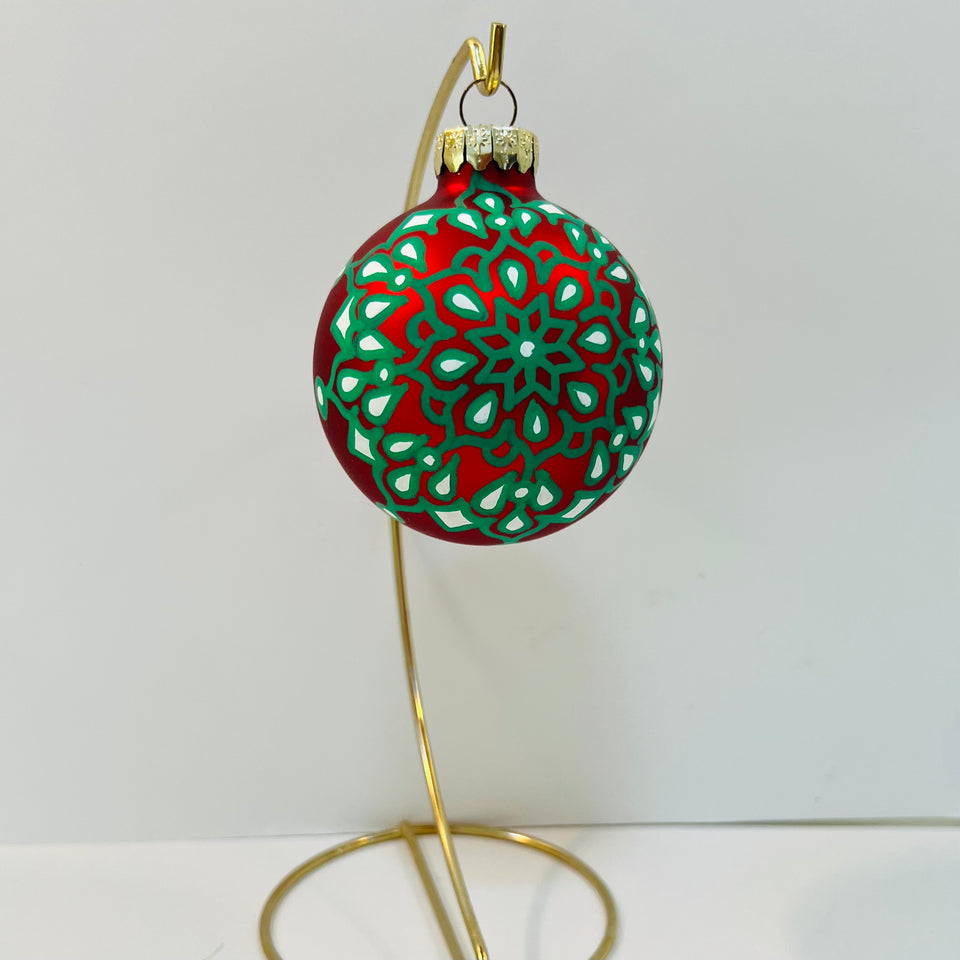 Red Glass Ornament with Hand-painted Green and White Mandala