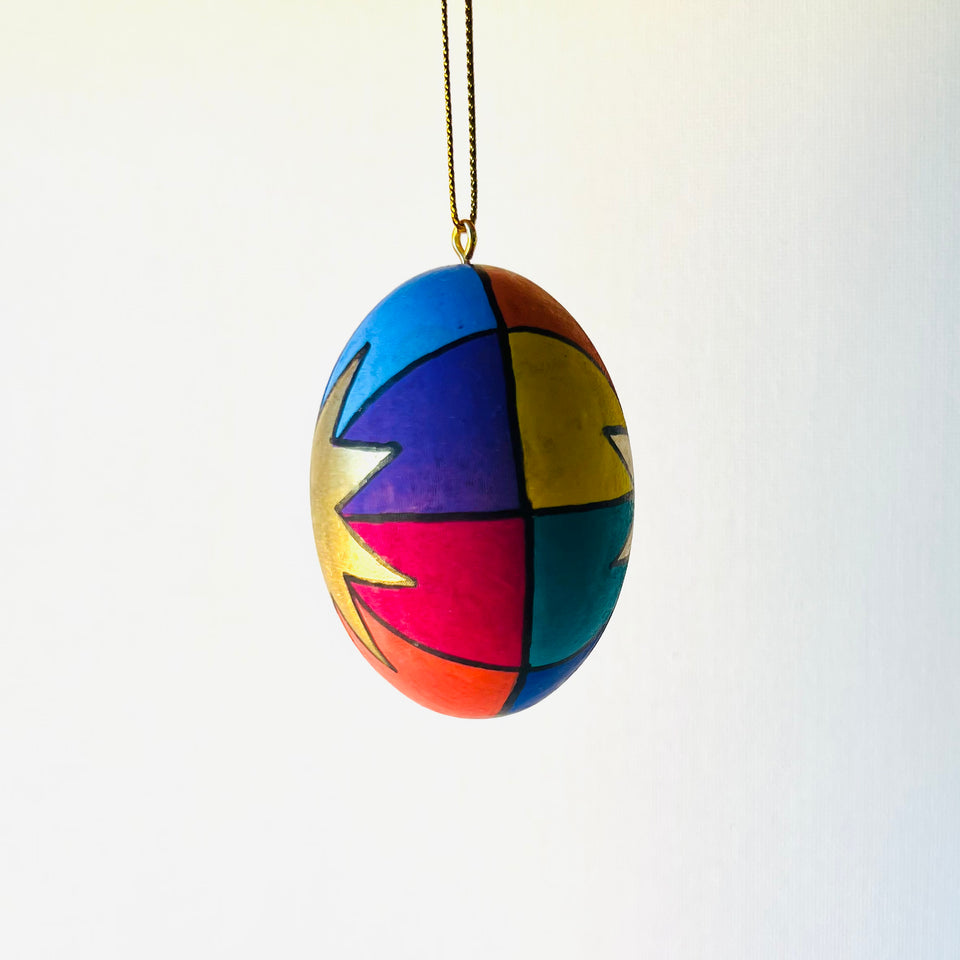 Wooden Egg Ornament with Multicolored Pattern Detail