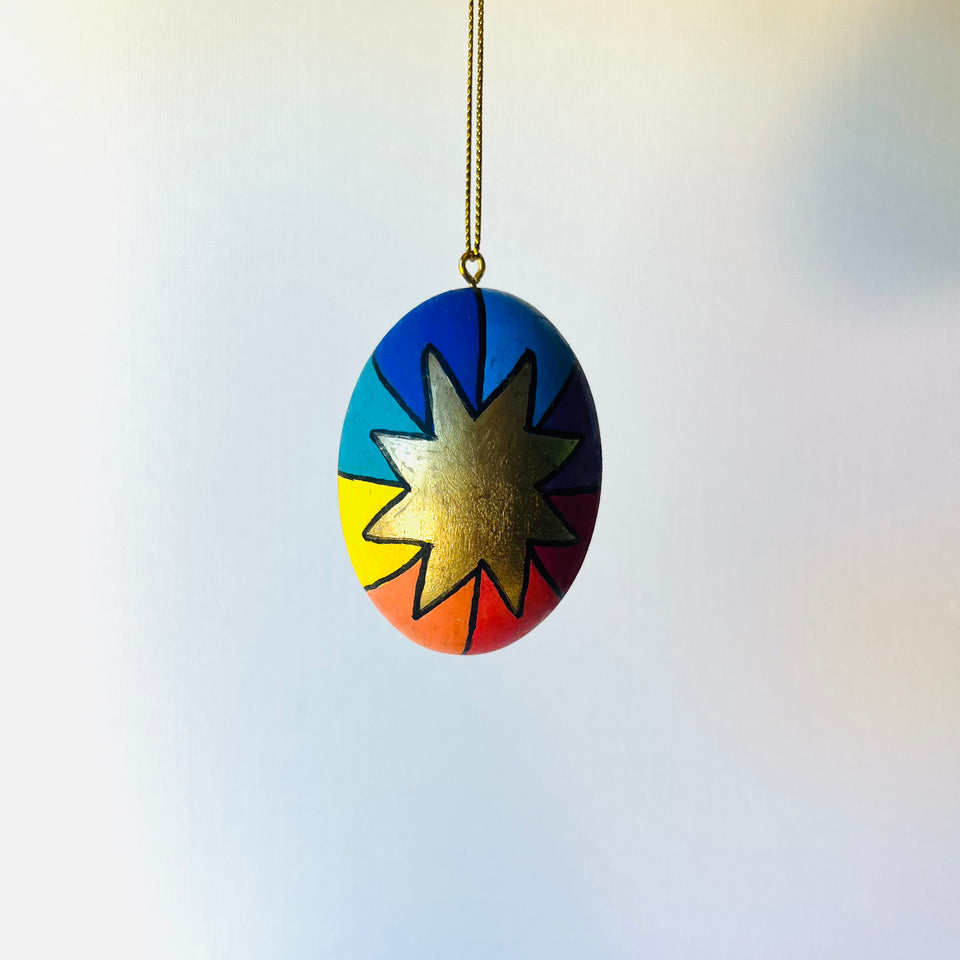 Wooden Egg Ornament with Multicolored Pattern Detail