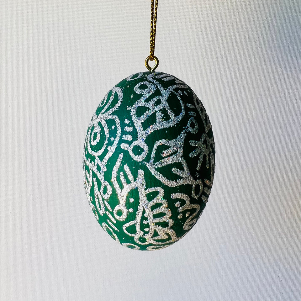 Wooden Egg Ornament in Green and White Detail