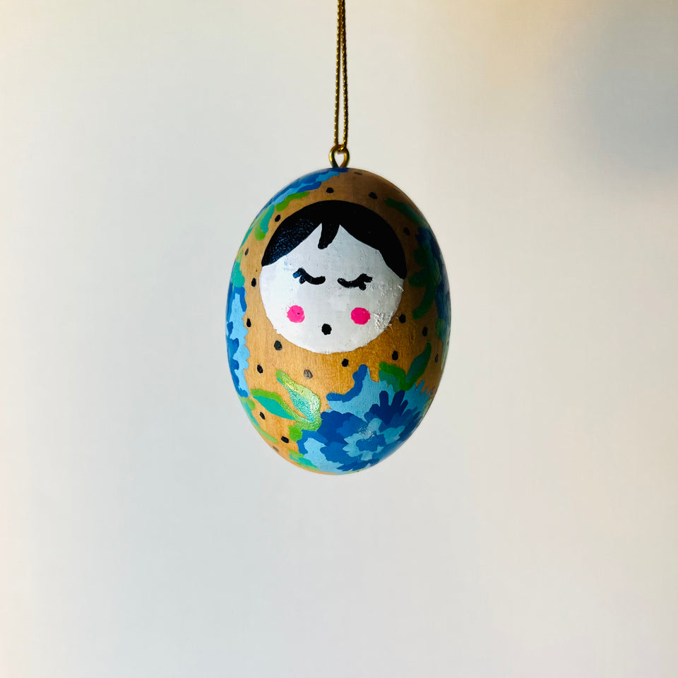 Wooden Egg Ornament with Hand-Painted Doll and Flowers in Blue