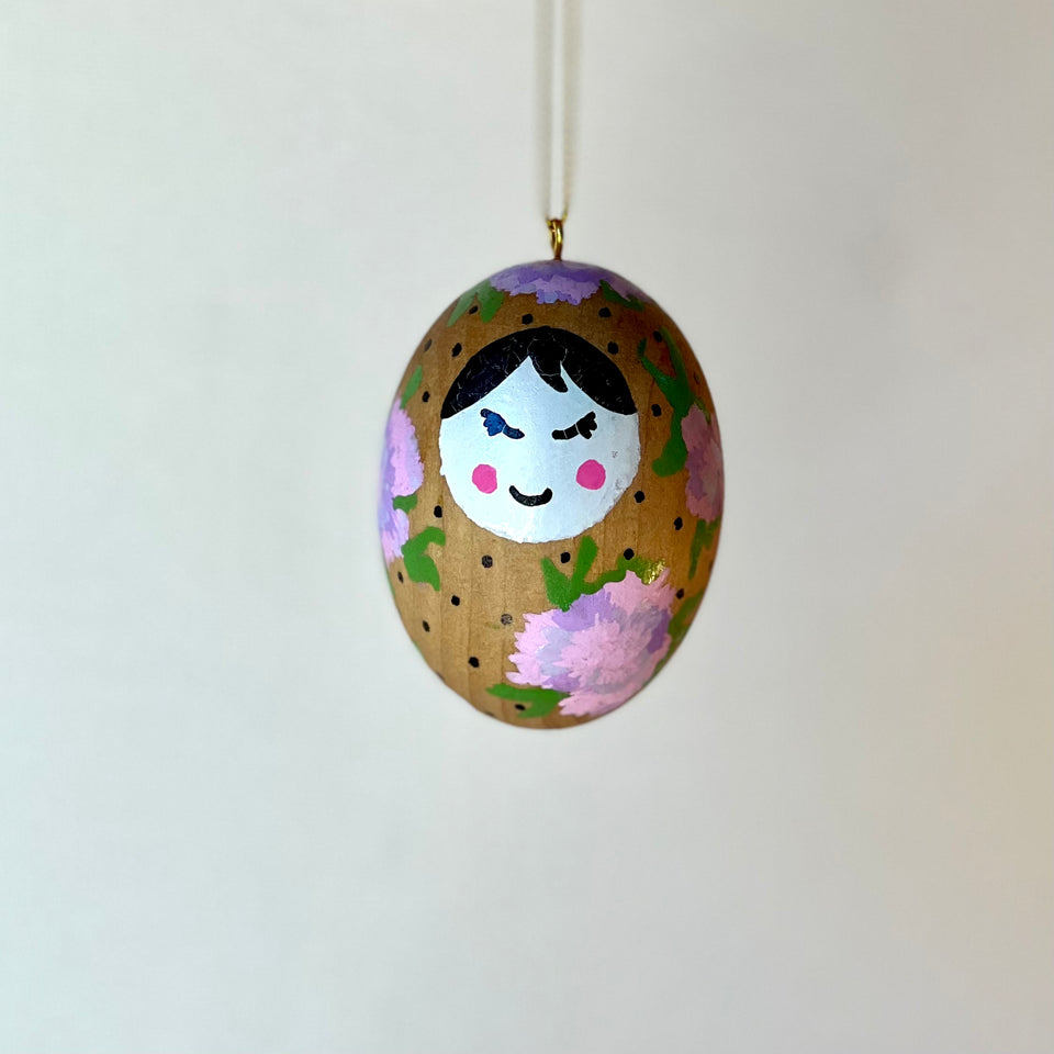 Wooden Egg Ornament with Hand-Painted Doll and Flowers in Pink and Purple
