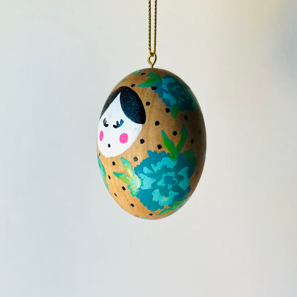 Wooden Egg Ornament with Hand-Painted Doll and Flowers in Teal