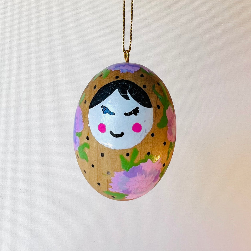 Wooden Egg Ornament with Hand-Painted Doll and Flowers in Pink and Purple