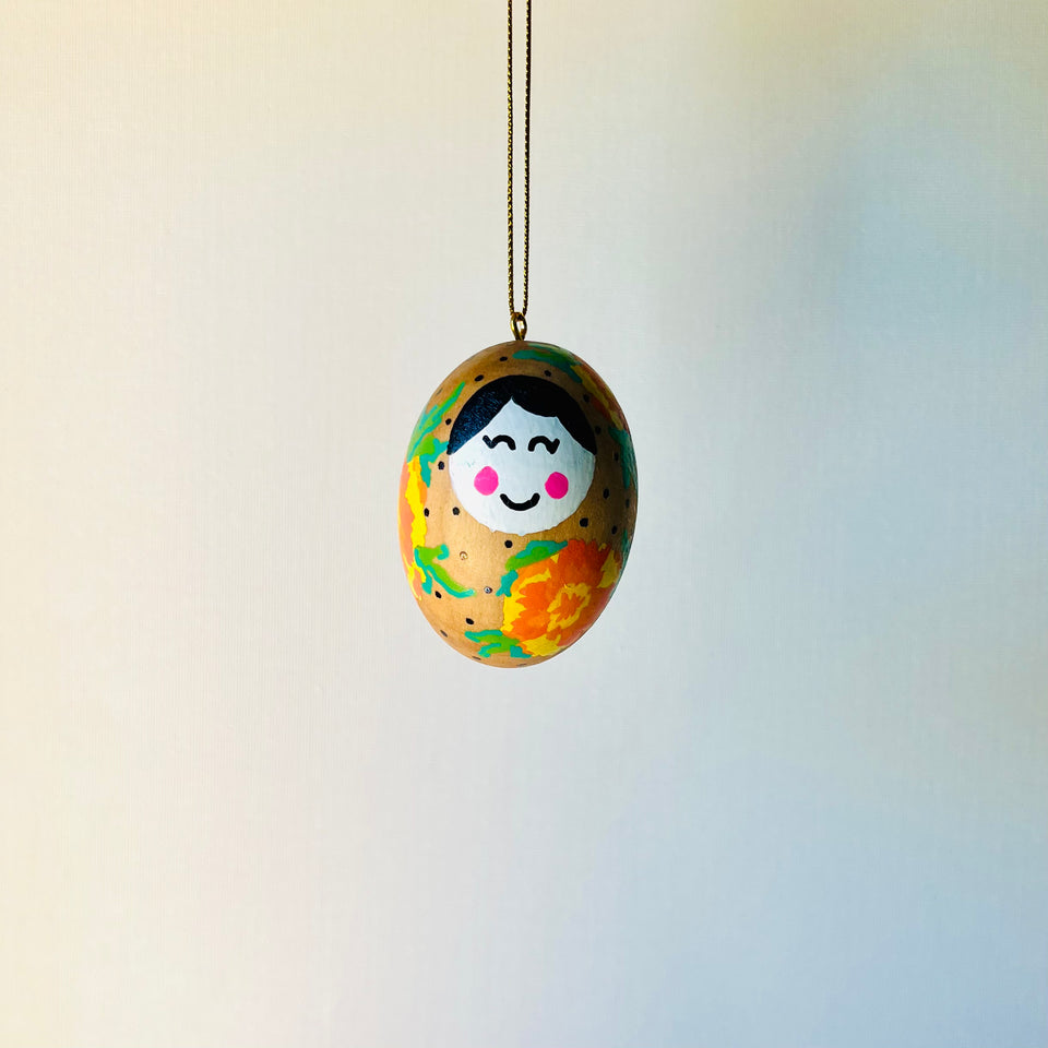 Wooden Egg Ornament with Hand-Painted Doll and Flowers in Yellow