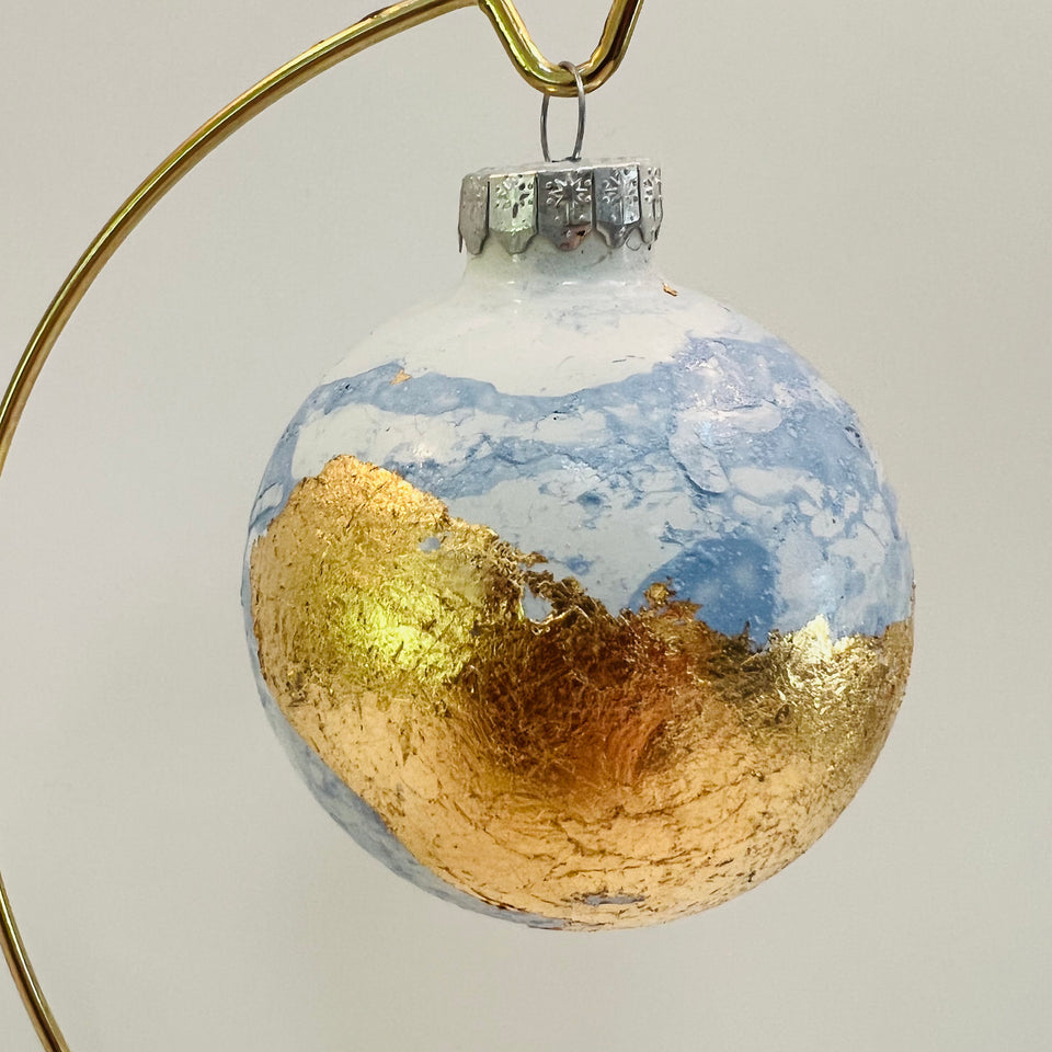 White Glass Ornament with Hand-painted Blue and Gold Leaf Design