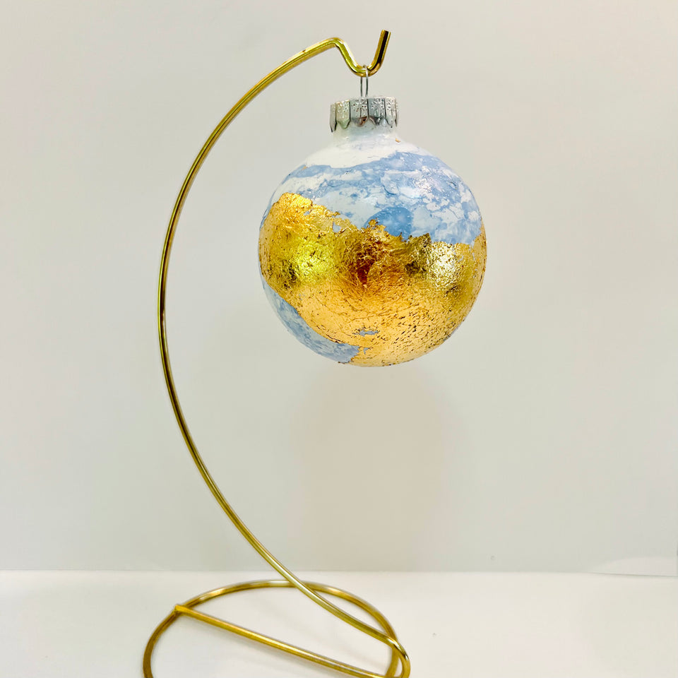 White Glass Ornament with Hand-painted Blue and Gold Leaf Design