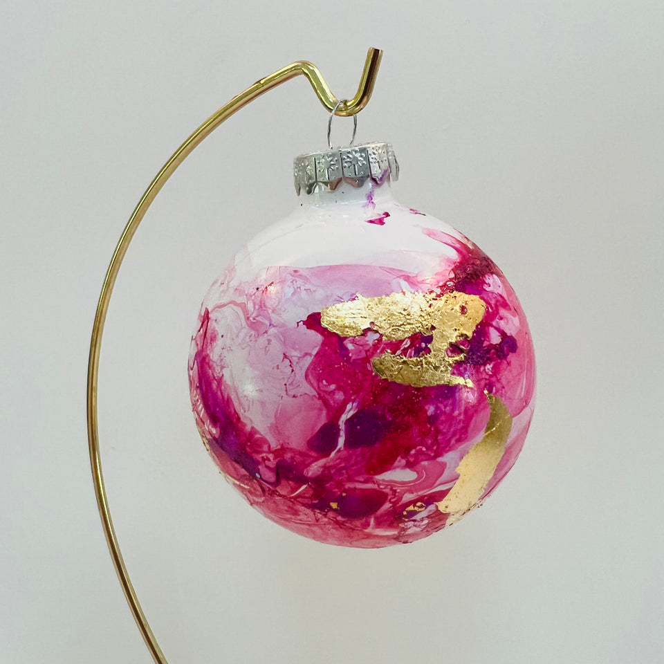 White Glass Ornament with Hand-painted Pink and Gold Leaf Design