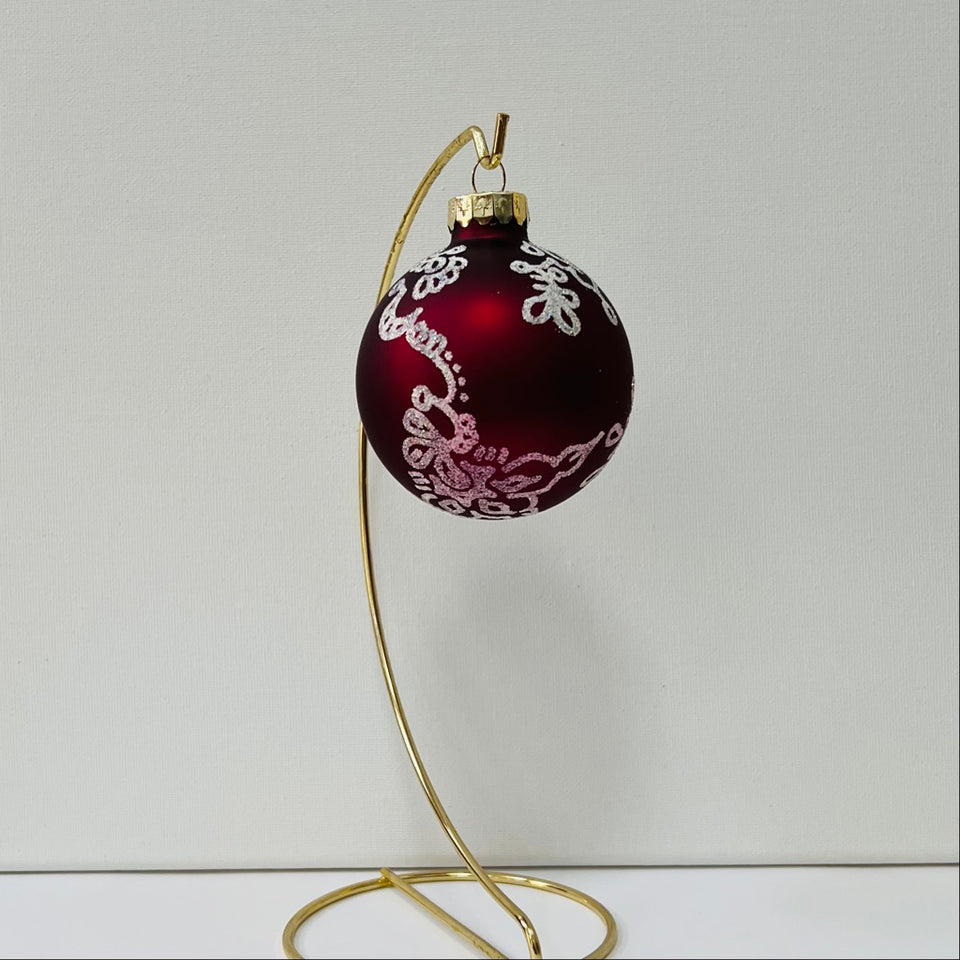 Burgundy Glass Ornament with Hand-Painted Frosted Design.