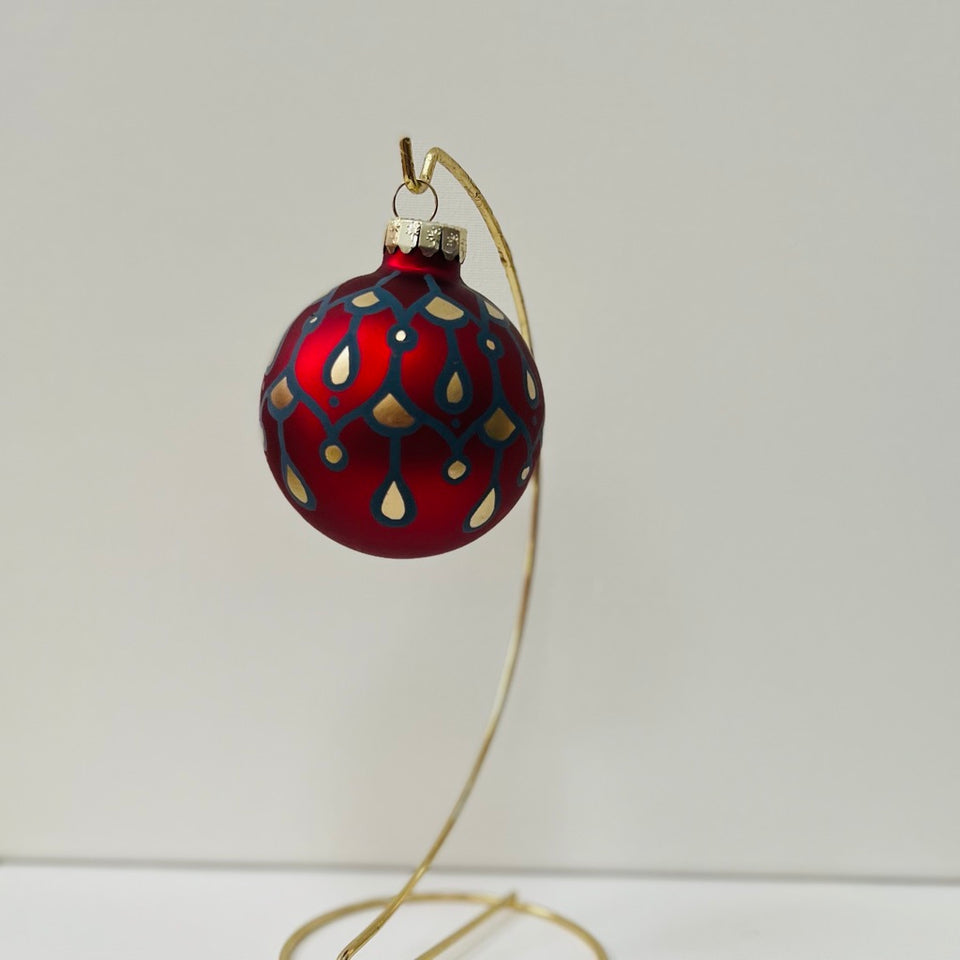 Red Glass Ornament with Hand-Painted Dusty Blue and Gold Design